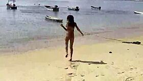 Monika Fox Strips Pink Bikini Teasing Big Tits on Sunny Beach