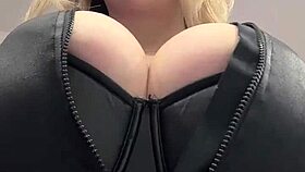 big natural tits bursting from tight leather