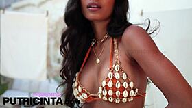 asian putri cinta slowly removes her orange bikini