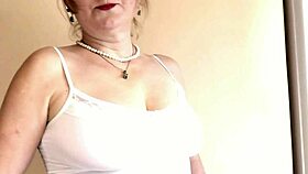 whoa look at this big ass mature blonde milf shaking her hairy pussy in stockings and heels