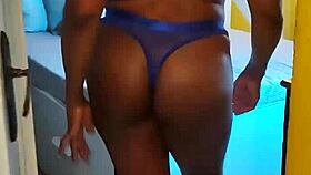slipping into bed wearing blue lingerie to finger myself slowly
