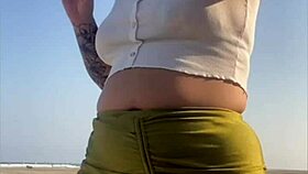 redhead beach exhibitionist flashes big swollen pussy lips