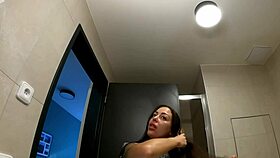 tattooed petite alia strips panties in bathroom flashing shaved tight pussy and ass