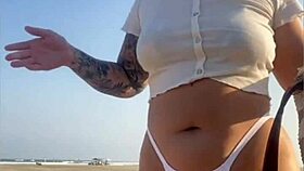 redhead beach exhibitionist flashes big swollen pussy lips