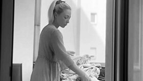 Chubby babe flashes shaved pussy on balcony for neighbors' outdoor thrill