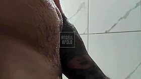 Masked Tattooed Hunk Toys in Shower to Explosive Cum!