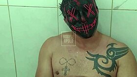Masked Tattooed Hunk Toys in Shower to Explosive Cum!