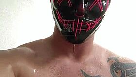 Masked Tattooed Hunk Toys in Shower to Explosive Cum!