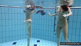 shaved brunette babe with massive tits teases underwater in the pool shower