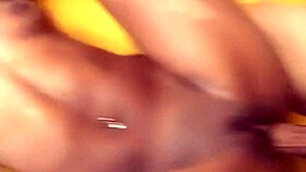 Black teen beauty bent over bed takes deep pounding