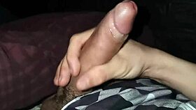 passionate solo guy strokes huge cock to explosive cumshot in dark bedroom loneliness