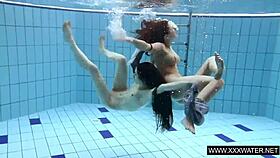 shaved brunette babe with massive tits teases underwater in the pool shower