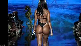 big ass bikini model struts her curves in a steamy revealing photoshoot session