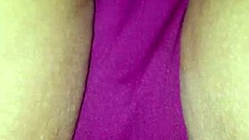 Spreading wet lips wide during erotic panty massage