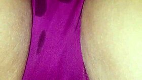 Spreading wet lips wide during erotic panty massage