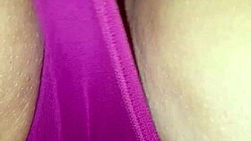 Spreading wet lips wide during erotic panty massage