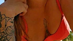 Watch me flash and tease beach hunks while filming hot video