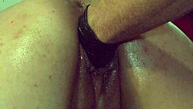Slut's pussy stretched wide by gloved fist