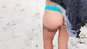 horny latina whore flashes big tits and ass on mexican beach in lingerie