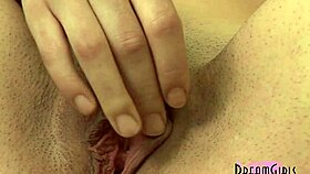 brunette dream girl bares shaved pussy for hot solo fingering and steamy sex tales on sofa