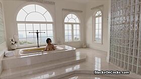 She slides her massive tits around that throbbing BBC in the steamy bathtub.