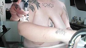 Brazilian BBW housewife flashes huge saggy tits while naked in kitchen
