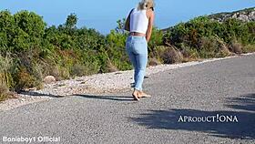 wetting her jeans on a bare foot hike