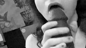 She grabs the huge BBC dildo for sloppy deepthroat practice up close.