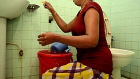 indian woman bathes sharing milk in bathroom scene