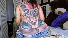 Horny Curly Tattoo Babe's Big Ass Crack Teases While Painting Nails