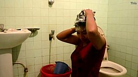 indian woman bathes sharing milk in bathroom scene
