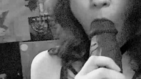 She grabs the huge BBC dildo for sloppy deepthroat practice up close.