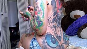 Horny Curly Tattoo Babe's Big Ass Crack Teases While Painting Nails