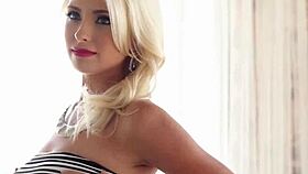 Gorgeous blonde milf model posed naked showing big tits