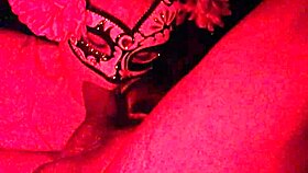 masked in the red light sucking cock
