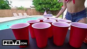 Party girls bailey base and michelle anderson get wild playing drink pong by the pool