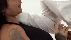 tattooed curvy brunette worships his cock on knees