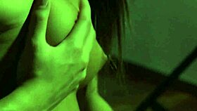 gorgeous girl watches herself in the mirror as she masturbates