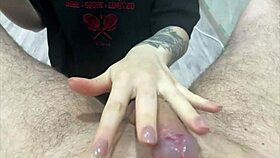 Caring girl massages testicles and plays with penis by hand