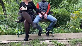 Curvy milf jerks off huge cock in park while reading
