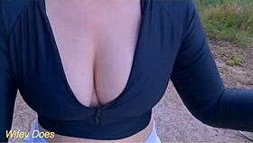 wife shows cleavage in tight shirt outdoors