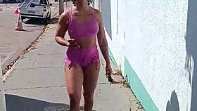 vivian fernandes walks down the street in shorts