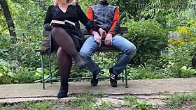 Curvy milf jerks off huge cock in park while reading