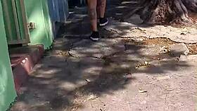 vivian fernandes walks down the street in shorts