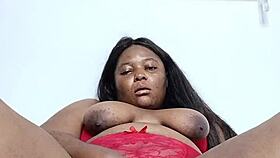 Ebony milf teases in red lingerie