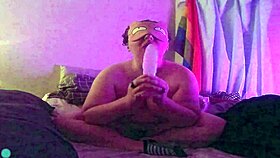 dildo fellatio on the bed